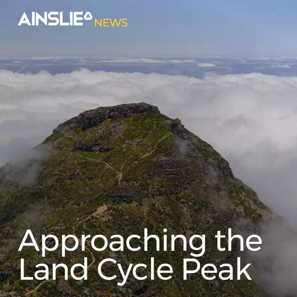 Approaching the Land Cycle Peak